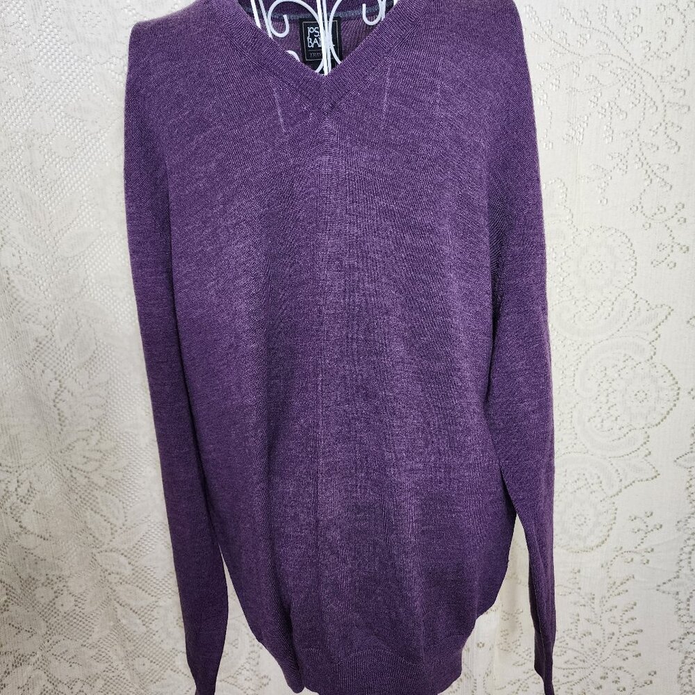 Jos. A. Bank Traveler 1/2 zip sweater in purple, made of 100% merino wool.